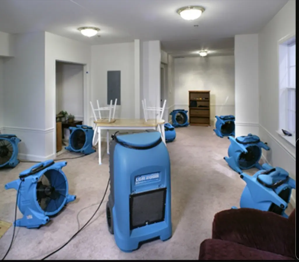 Air movers and dehumidifier setup for Water Extraction & Removal in Carlisle